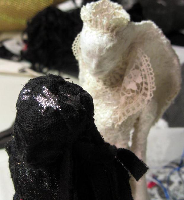 embroidered figures, Ice Queen and Night, details